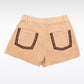FALDA SHORT BOLSILLOS ANDINOS + PLIEGUES - BEIGE (MUJER)